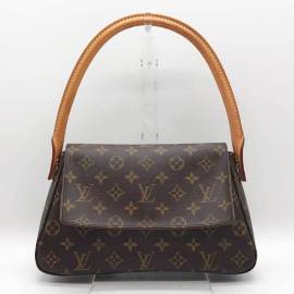 Louis Vuitton Looping Segeltuch Handtaschen von Louis Vuitton